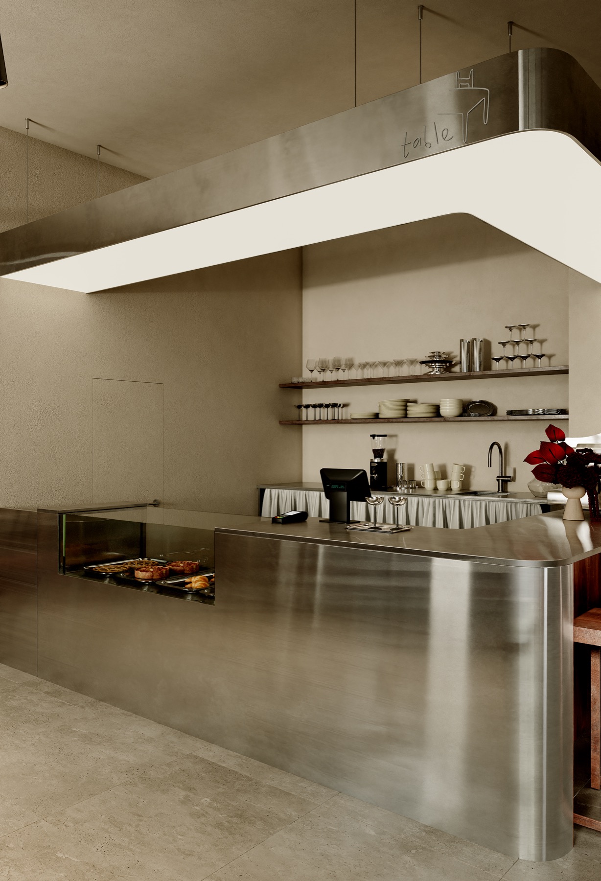 Cafe Table, Astana — stainless steel counter beneath a backlit canopy